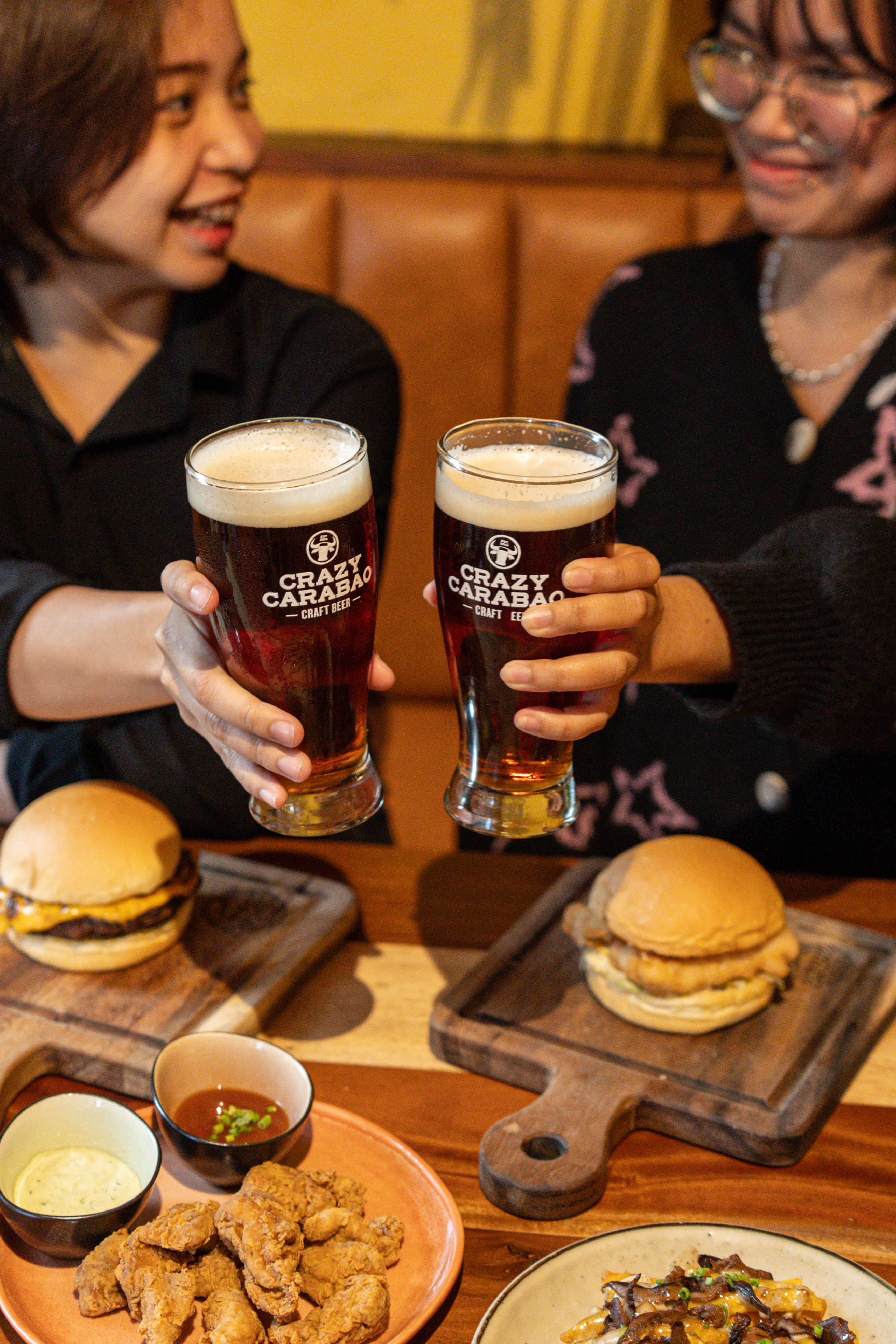 Friends toasting beers